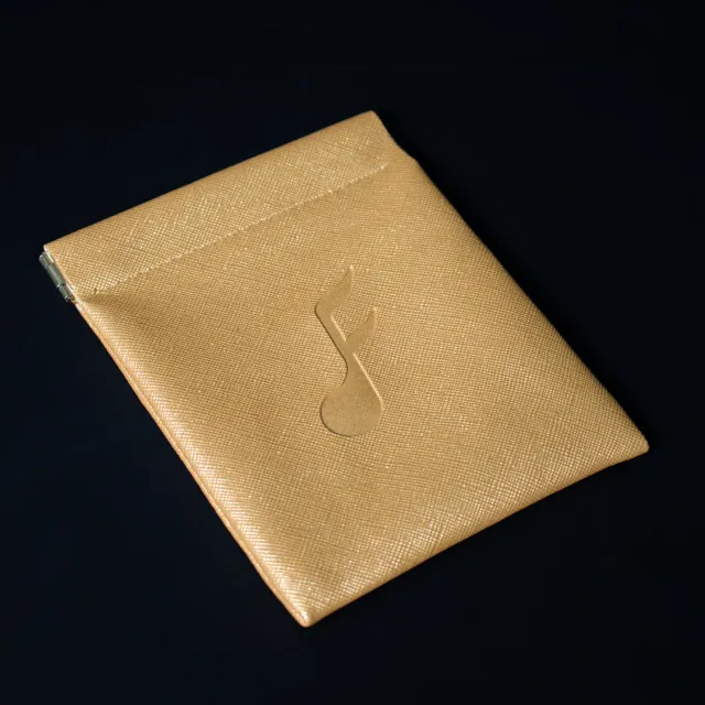 Fatfreq Gold Squeeze opbergzakje voor oordopjes goud